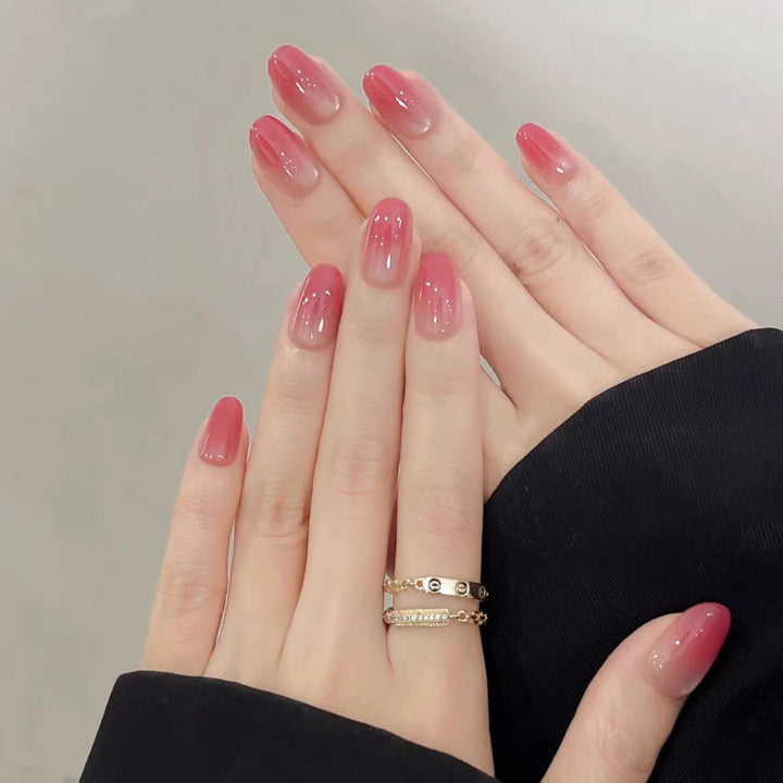 Artificial nails with elegant ombre effect and glitter coating Bowlift