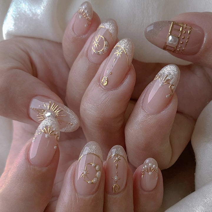 Glamorous nail art with fine gold accents Bowlift