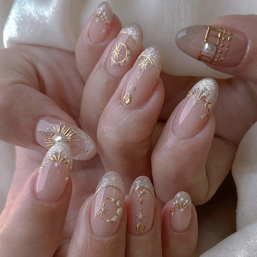 Glamorous nail art with fine gold accents Bowlift