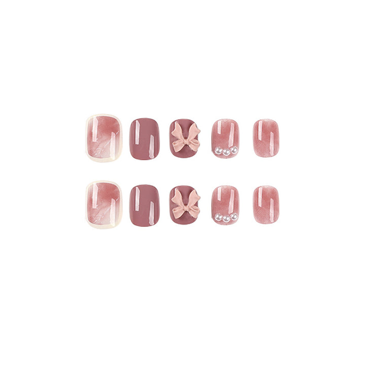 Artful nail art with luxurious 3D bows and elegant accents Bowlift