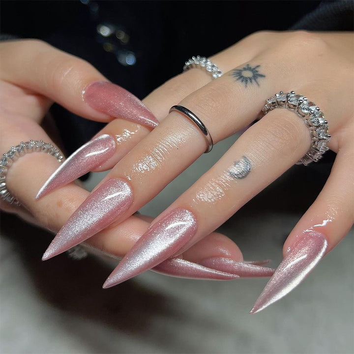Artful Stiletto Nails with Shimmering Glitter Bowlift