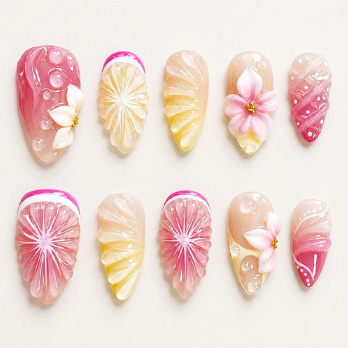 Artificial nail set with elegant floral details and glitter effects Bowlift