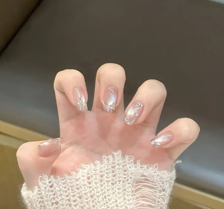Artificial nails with glamorous rhinestone design Bowlift
