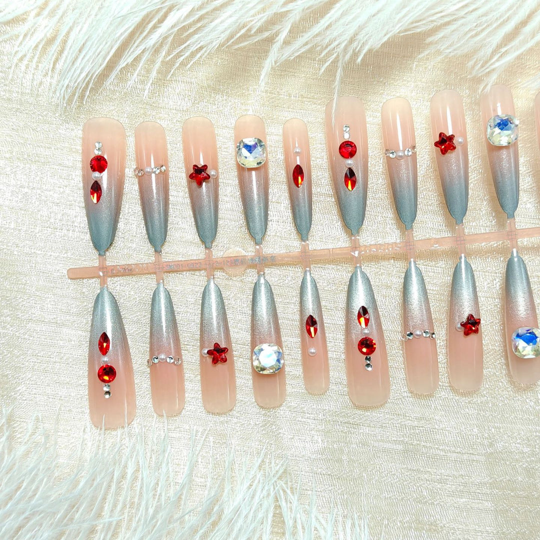 Artificial nails with glamorous design and sparkling accents Bowlift