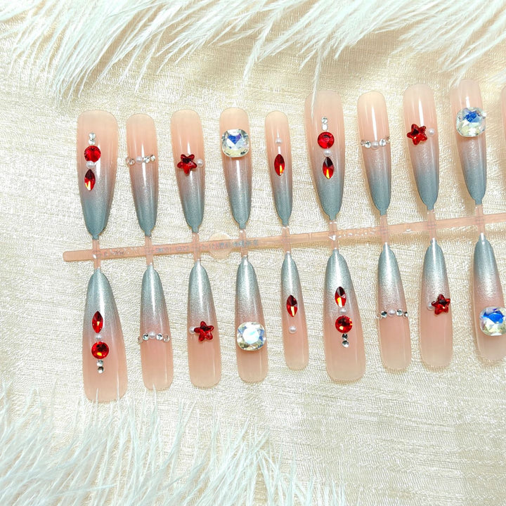 Artificial nails with glamorous design and sparkling accents Bowlift