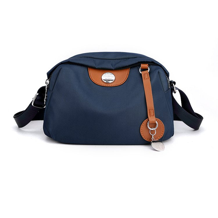 Shoulder bag with adjustable shoulder strap and clear compartment system Bowlift