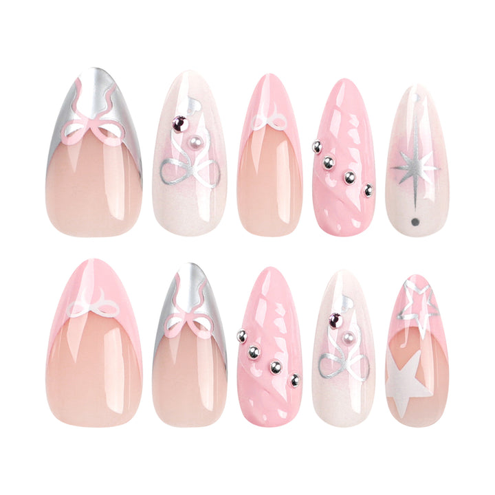 Artistic Nail Art with decorative bows and glitter accents Bowlift