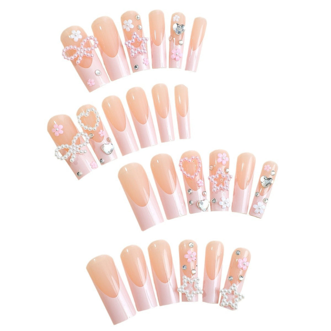 Glamorous artificial nail design with golden accents Bowlift
