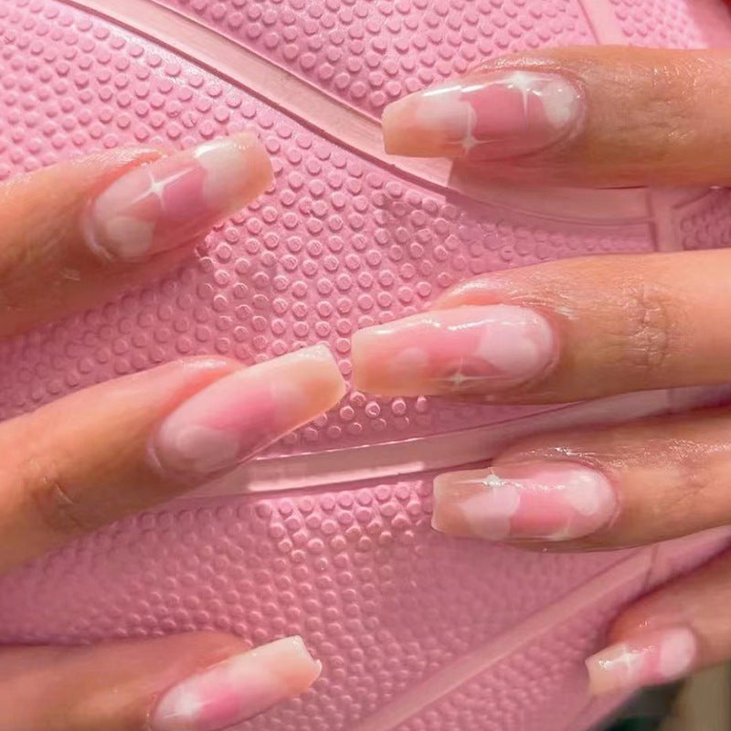 Artful Gel Nails with Elegant Floral Design and Glitter Accents Bowlift