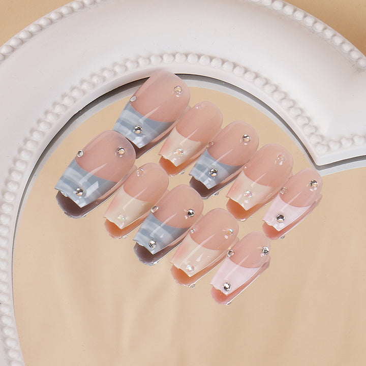 Artistic Press-On Nails with Rhinestone Accents Bowlift