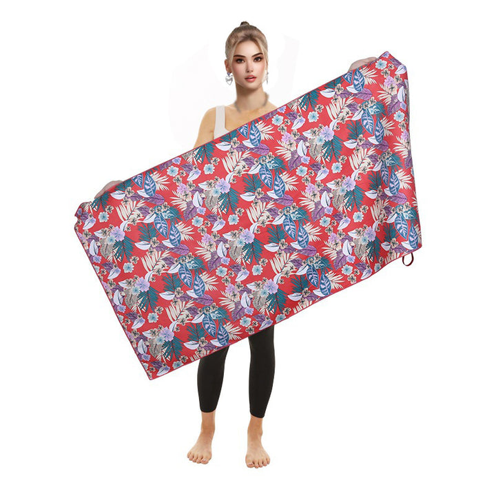 Beach towel with vibrant flamingo motifs and quick-drying material Bowlift