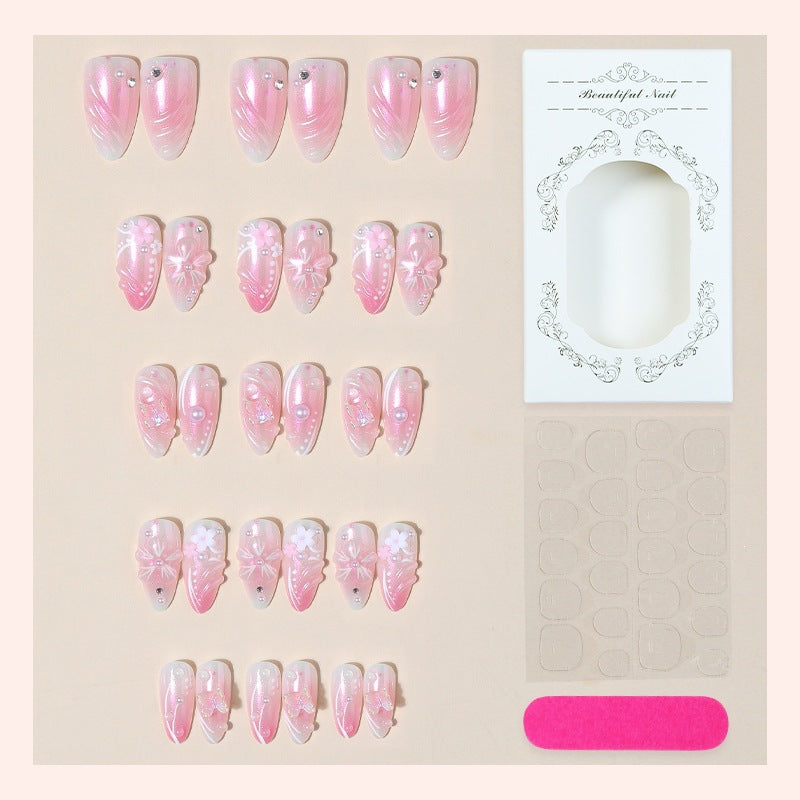 Acrylic nail set with elegant flower design and glitter accents Bowlift