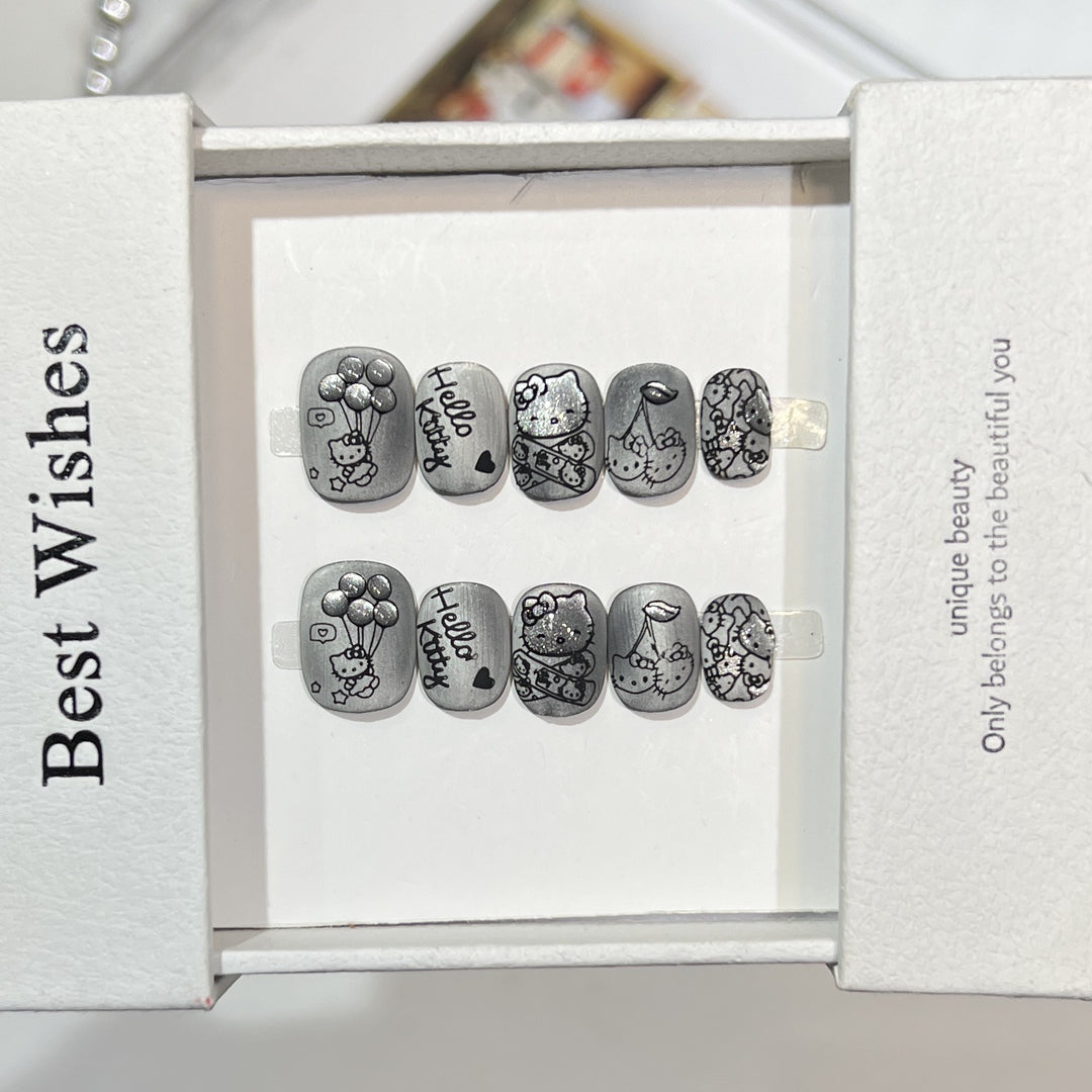 Artistic Press-On Nail Set with Whimsical Character Designs Bowlift