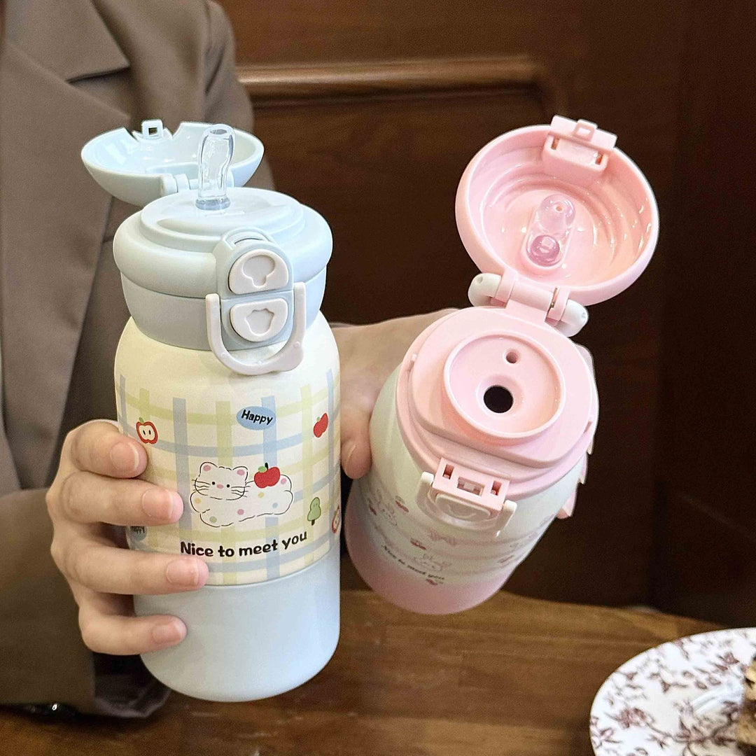 Women's insulated drinking bottle with practical flip lid and cheerful design Bowlift