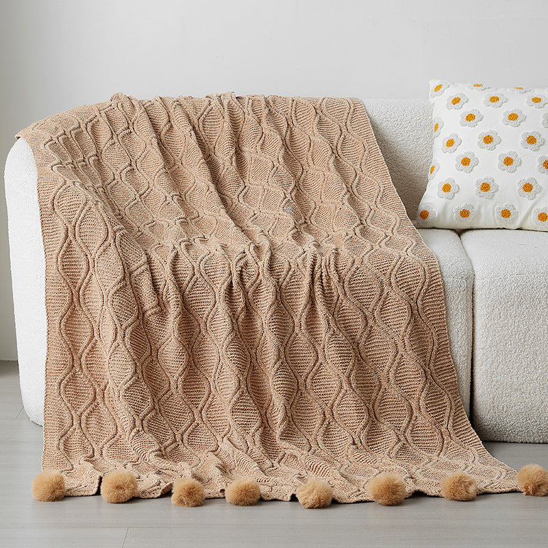 Ladies knit blanket with decorative pom poms Bowlift
