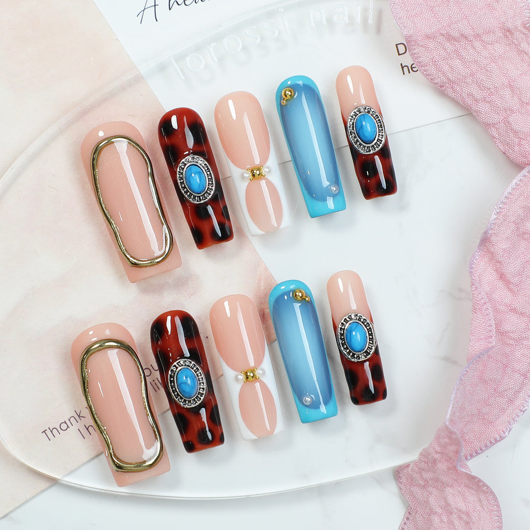 Acrylic nail set with luxurious design elements and creative accents Bowlift