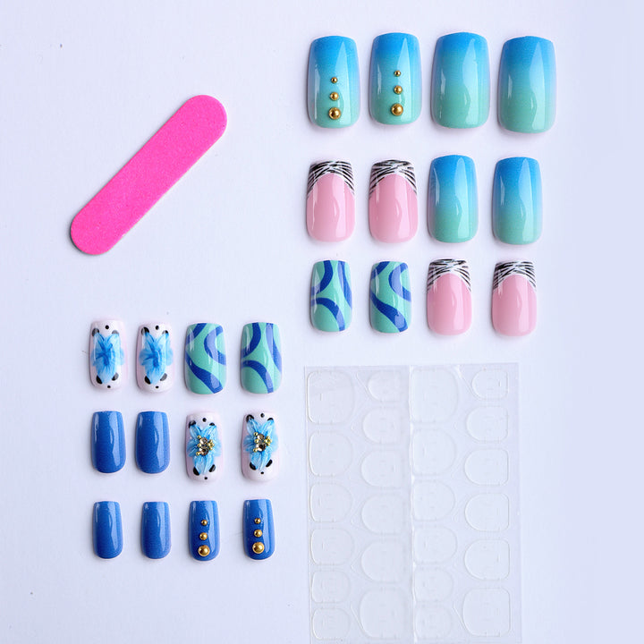 Artificial fingernails with handcrafted designs Bowlift
