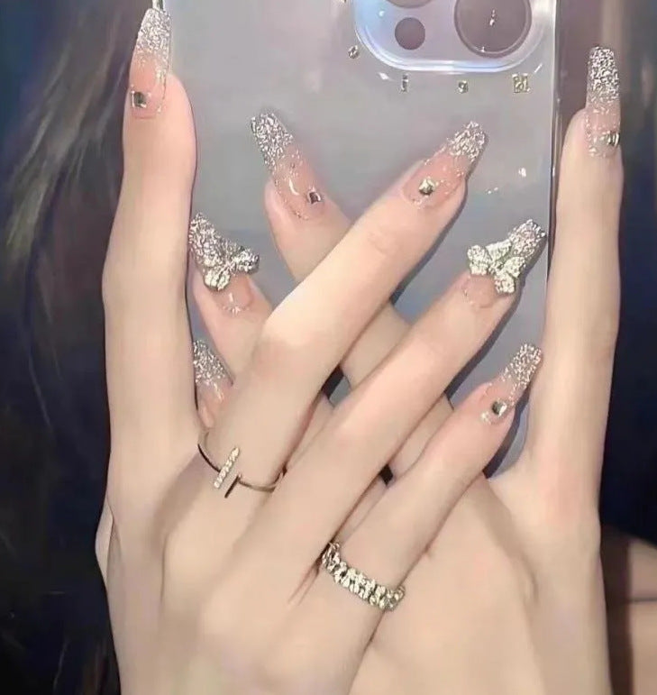 Elegant nail design with pearl embellishment Bowlift