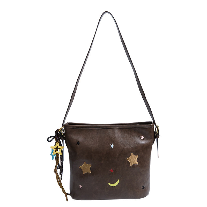 Shoulder bag with charming applications Bowlift