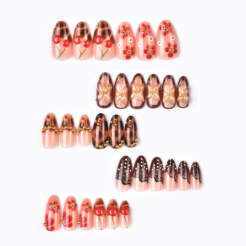 High-quality artificial nail creation with floral decorations Bowlift