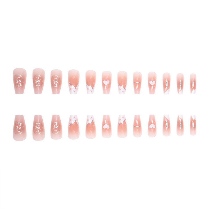 Elegant Long Press-On Nails with Artistic Heart and Gem Accents Bowlift