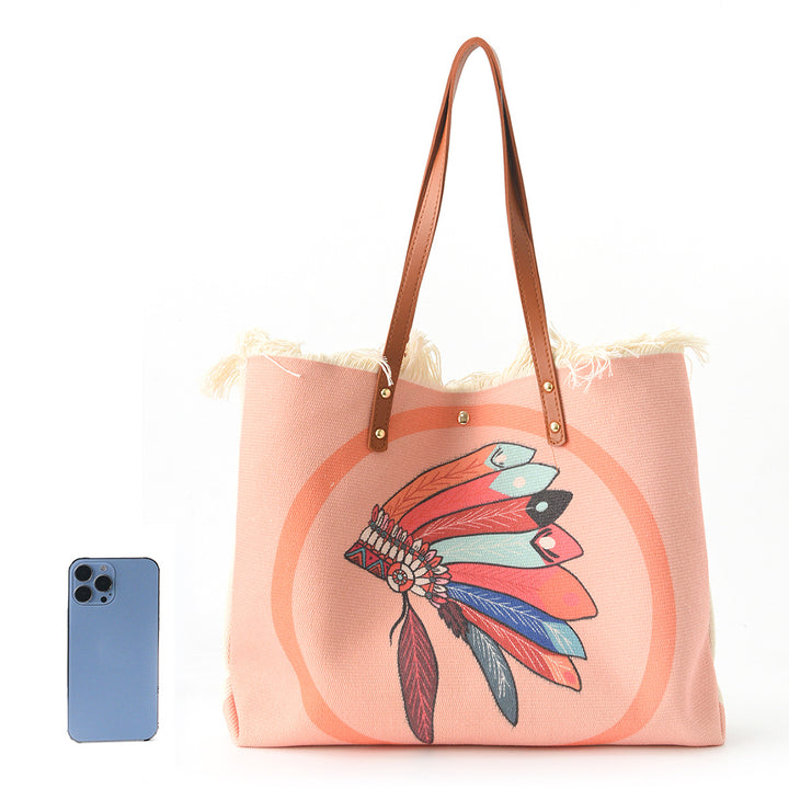 Beach bag with floral pattern and fringes Bowlift