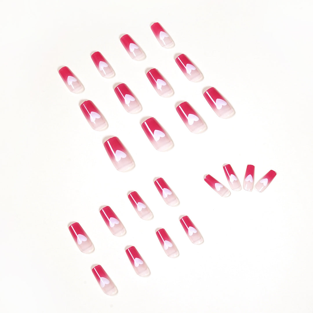 Artful nail extensions in romantic heart design Bowlift