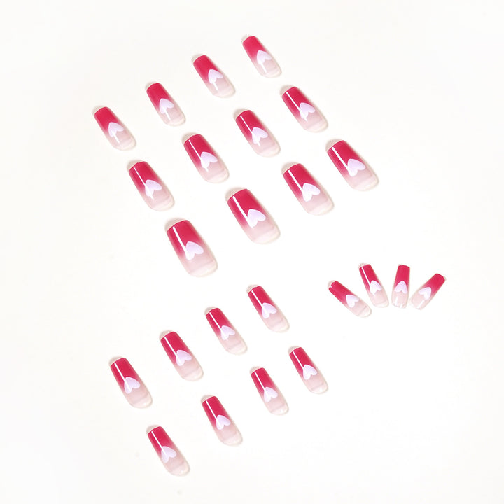 Artful nail extensions in romantic heart design Bowlift