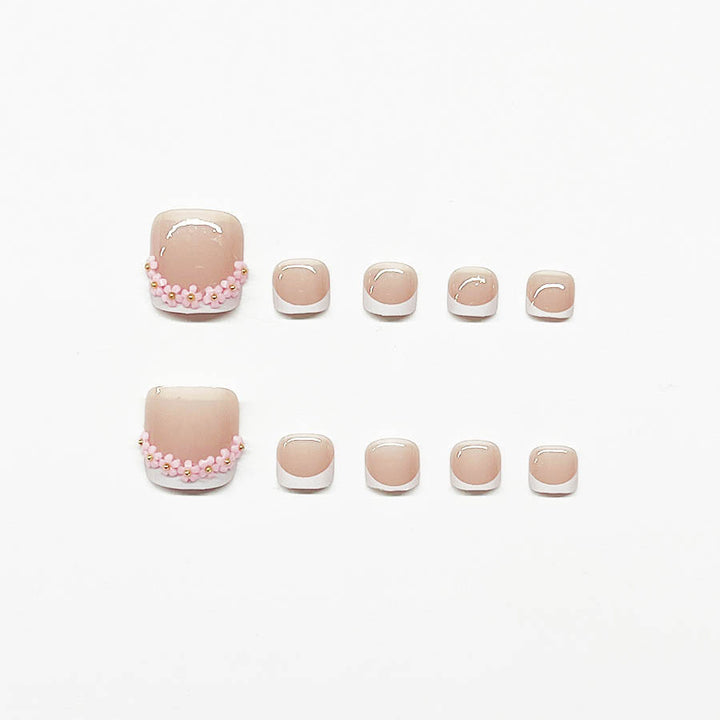 Nail art set with elegant French design and glamorous rhinestone accents Bowlift