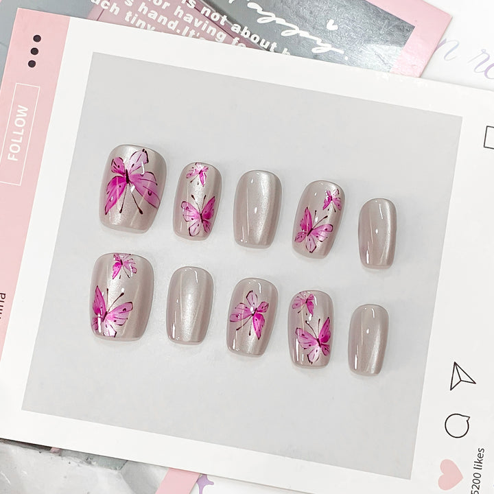 Artistic and elegant artificial nails with butterflies Bowlift