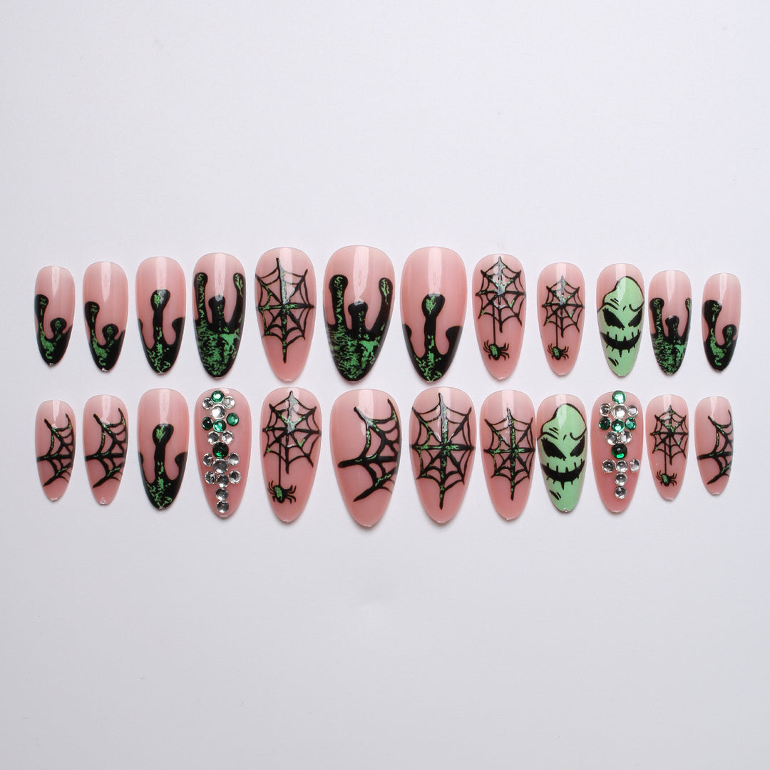 Acrylic nails with Halloween spider design and glitter accents Bowlift