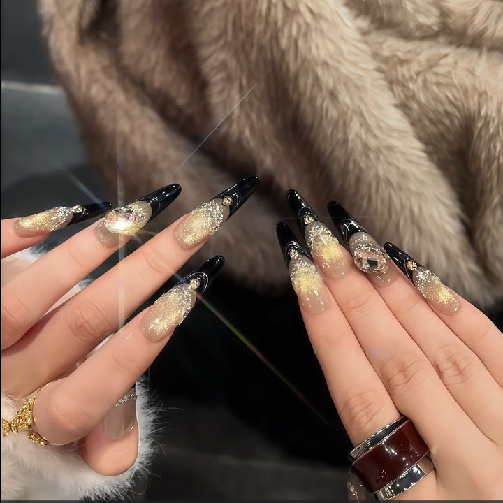 Glamorous artificial nails with extravagant rhinestone and glitter insets Bowlift