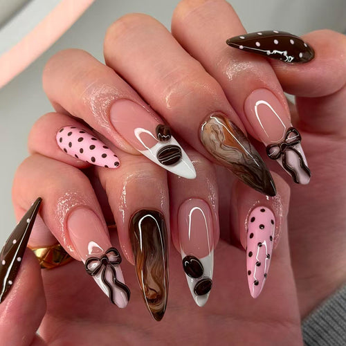 Elegant artificial nails with chocolate motifs and 3D elements Bowlift