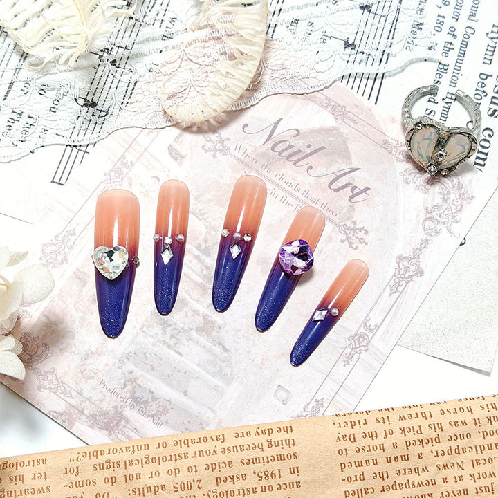 Artificial nails with glitter and elegant 3D applications Bowlift