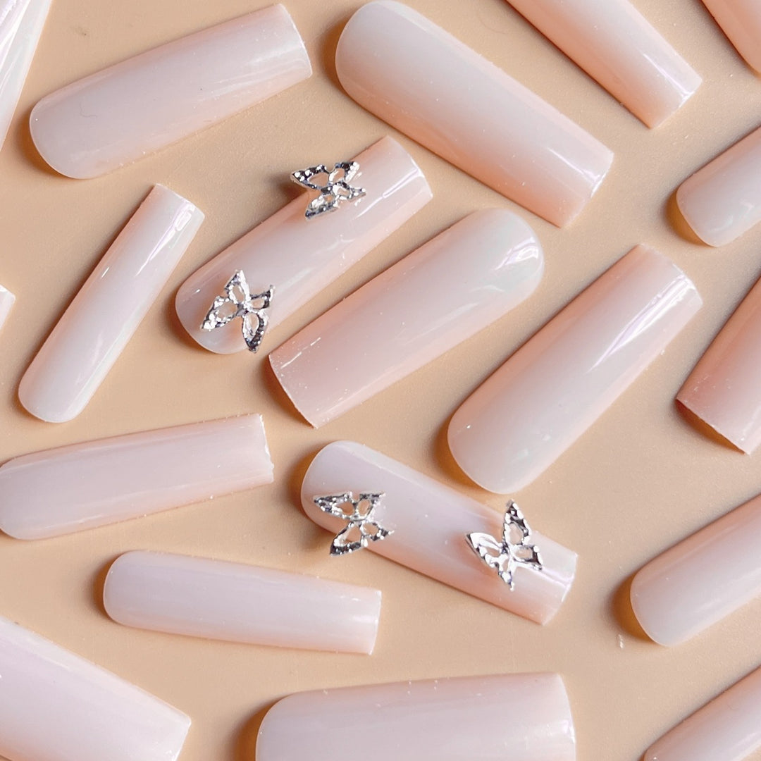 Elegant Long Coffin Nail Extensions with Butterfly Accents Bowlift