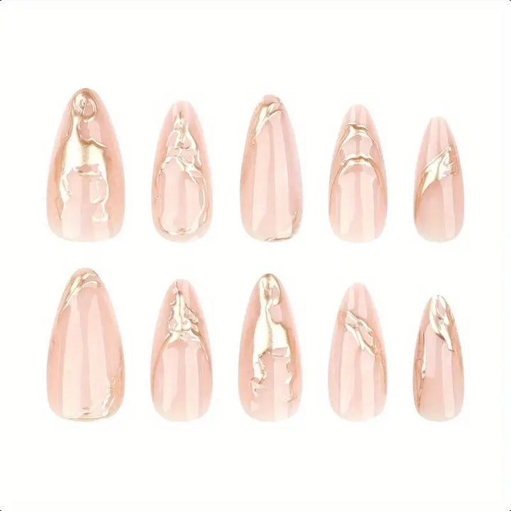 Elegant Stiletto Nail Enhancements with Gold Accent Details Bowlift
