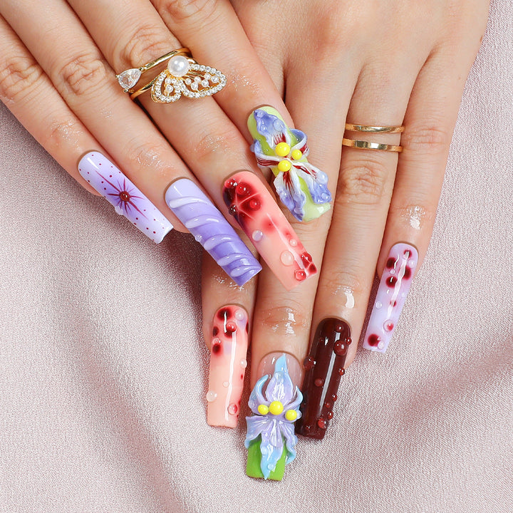 Creative artificial nail set with elegant floral design and glitter accents Bowlift