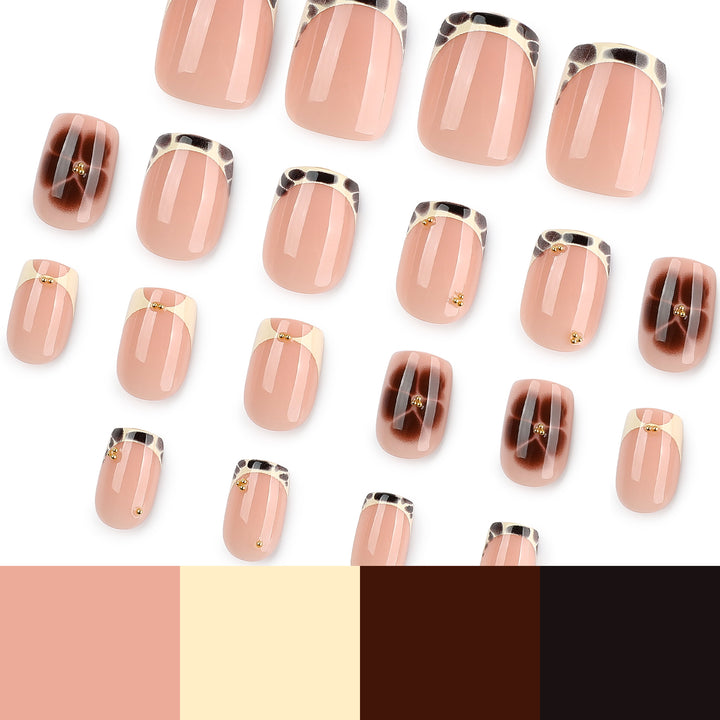 Artful nail extensions with an elegant giraffe pattern and golden accents Bowlift