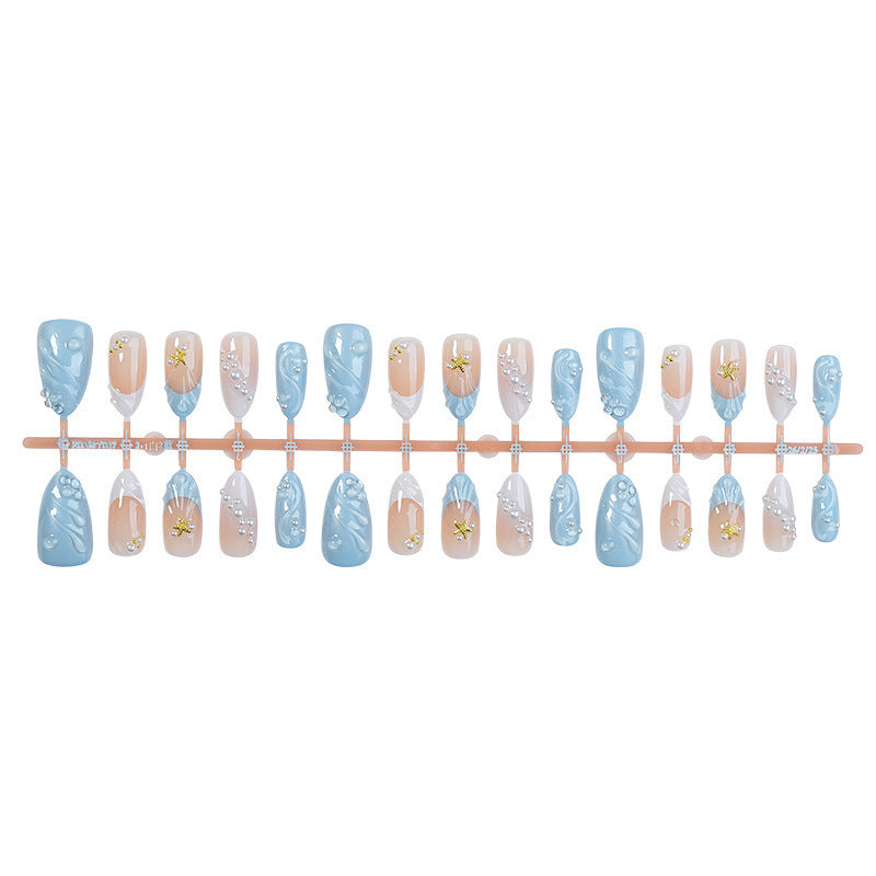 Artificial nail set with glittering accents and floral design Bowlift
