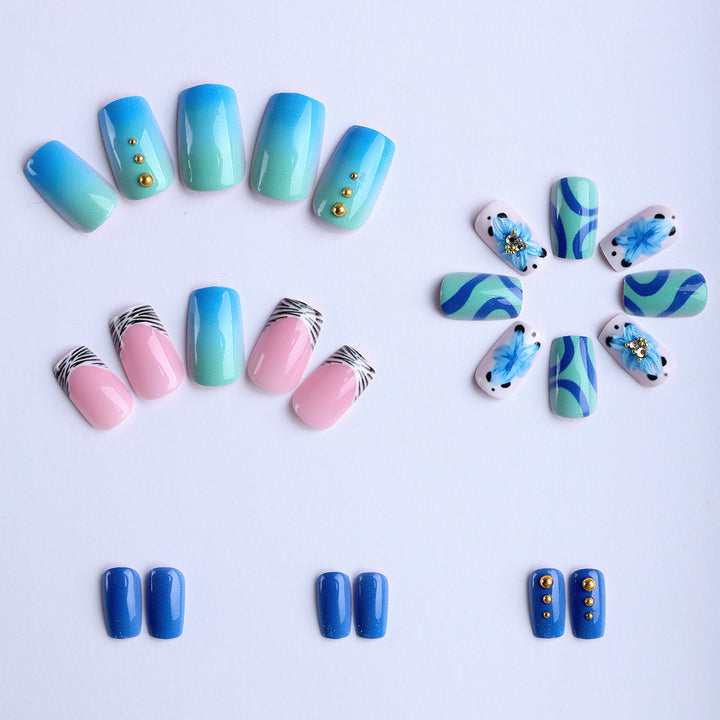 Artificial fingernails with handcrafted designs Bowlift