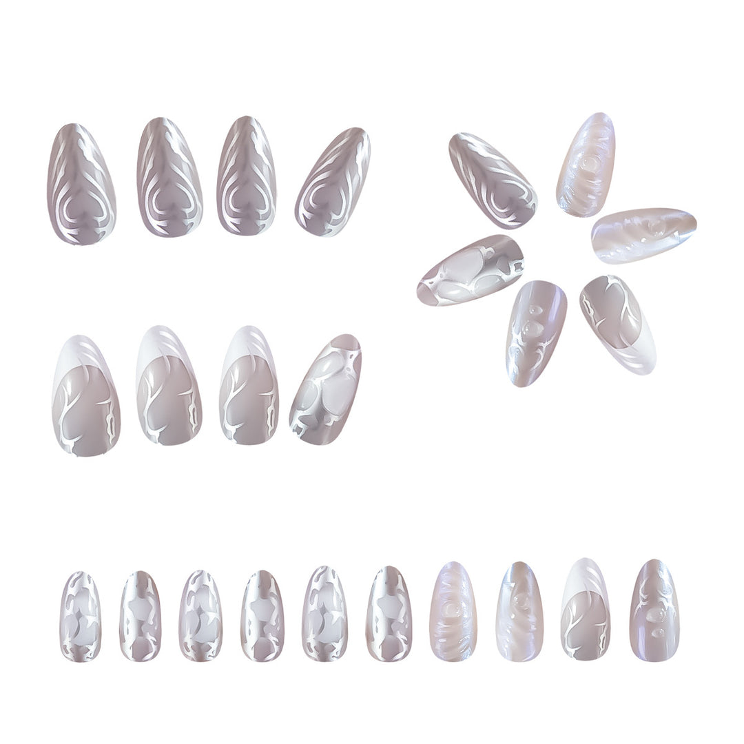 Elegant Stiletto Nail Extensions with Decorative Silver Accents Bowlift