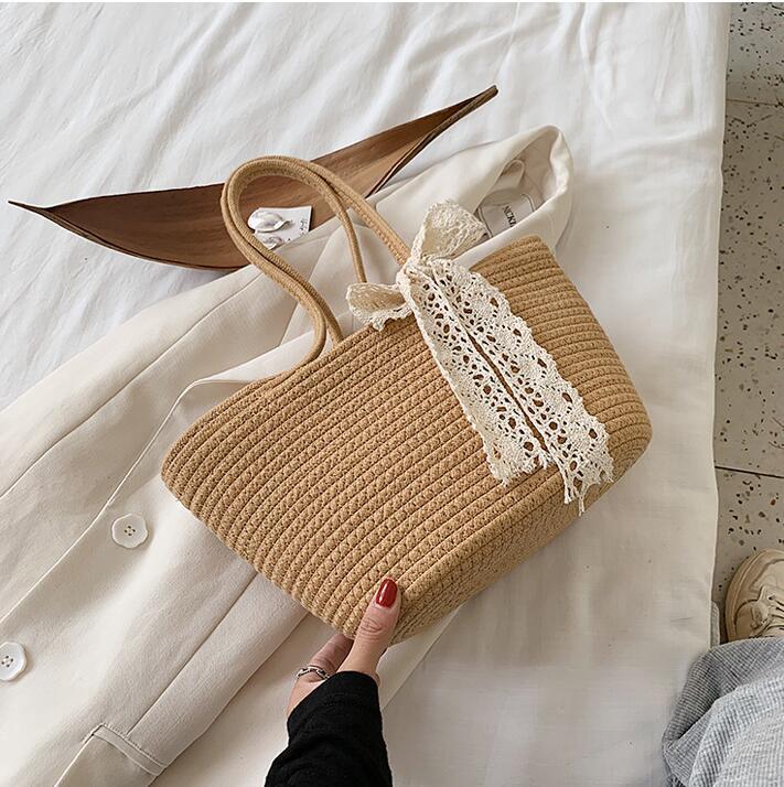 Elegant Bast Handbag with Lace Accent Bowlift