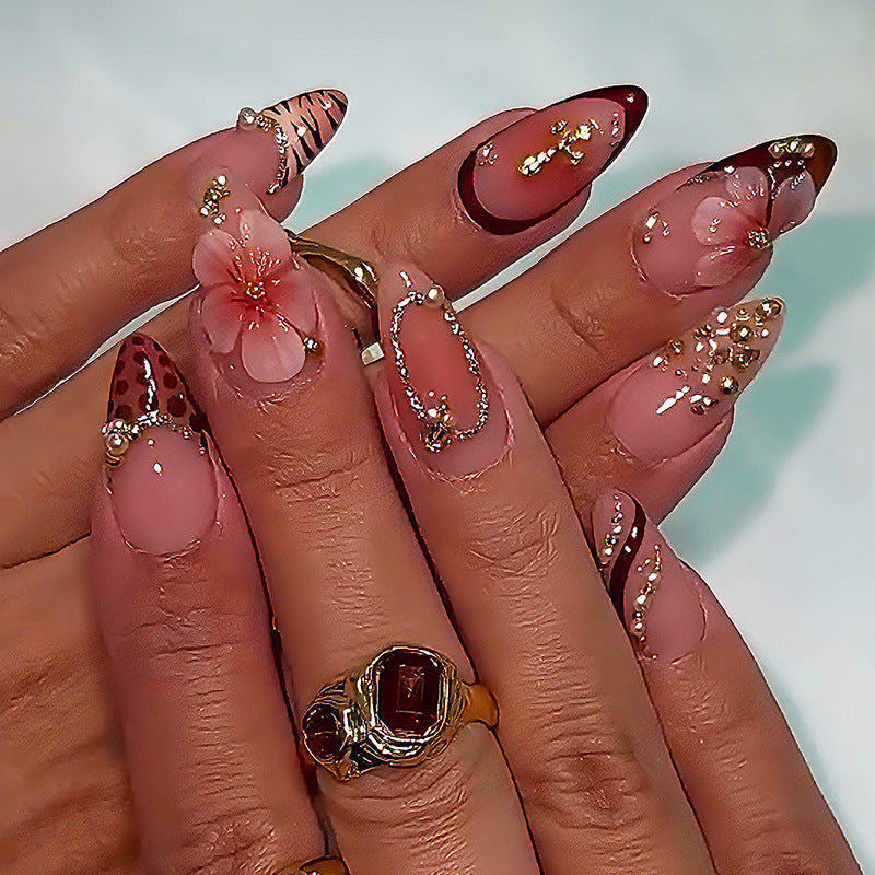 Creative nail art set with floral and glamorous accents Bowlift