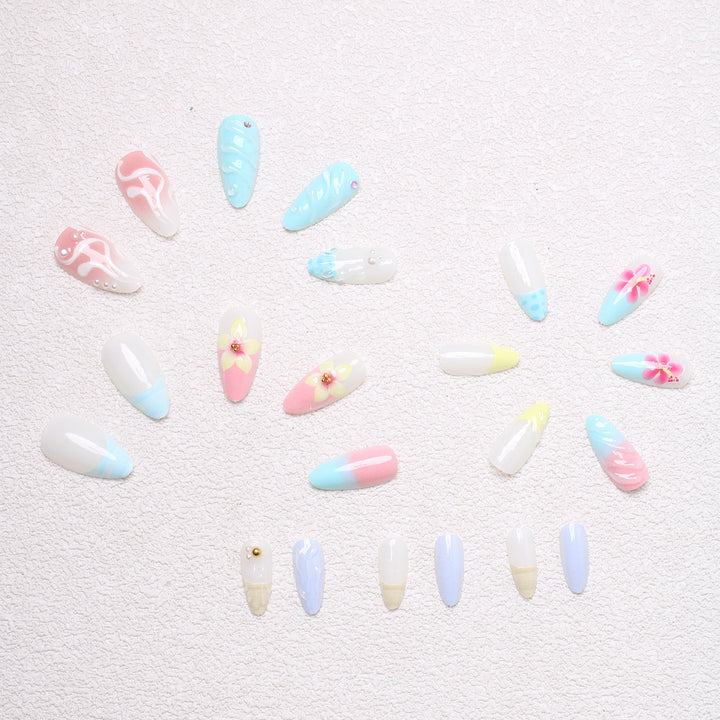 Artificial nail set with floral and shell-shaped designs Bowlift