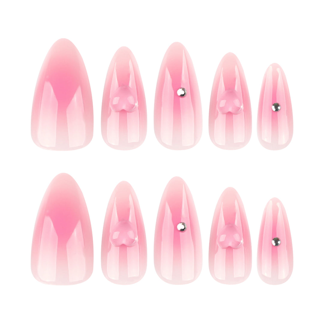 Artful stiletto nails with heart design and glitter accents Bowlift