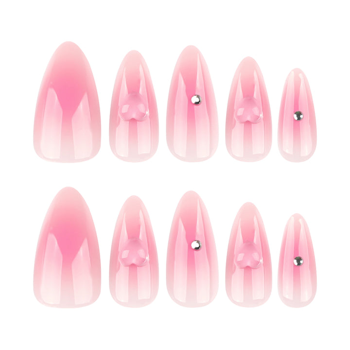 Artful stiletto nails with heart design and glitter accents Bowlift