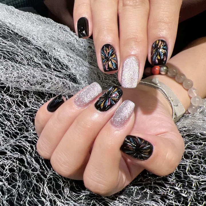 Artificial nails with glitter and floral patterns Bowlift