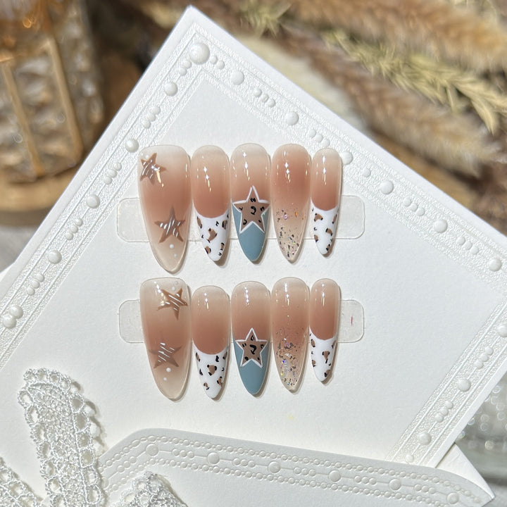 Elegant Stiletto Press-On Nail Set with Artistic Accents Bowlift