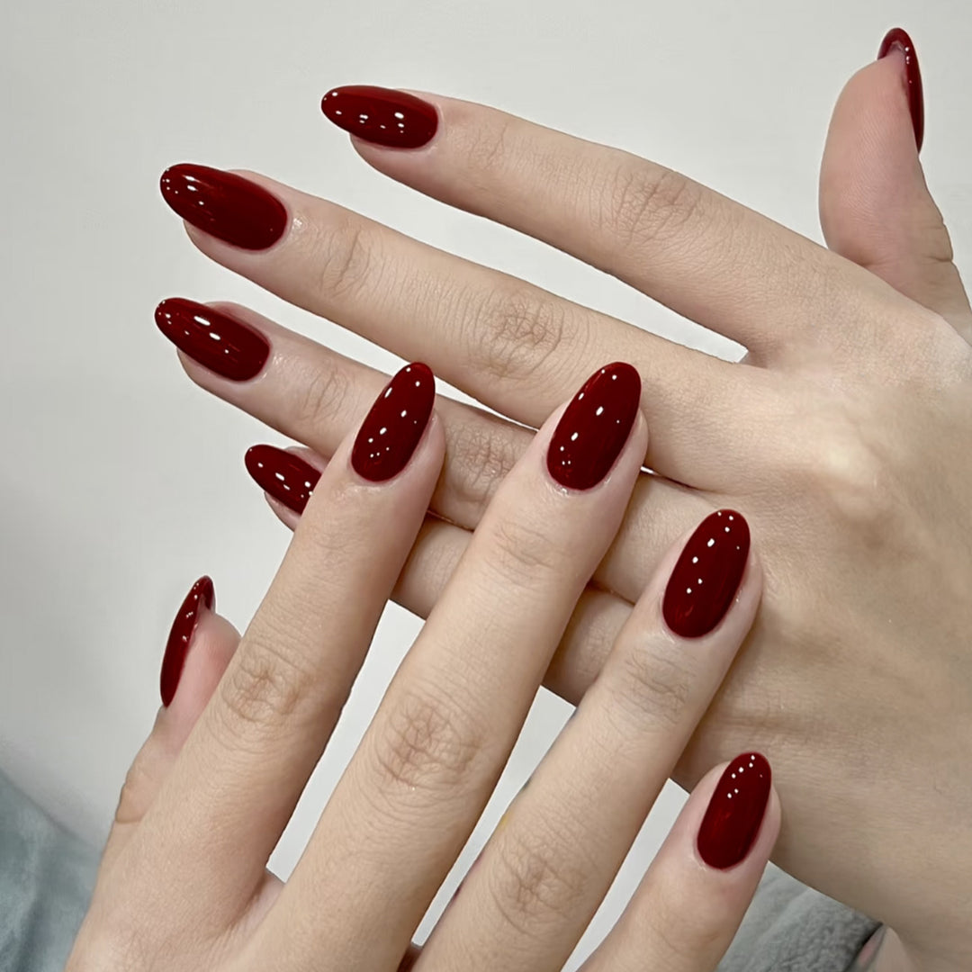 Glossy Almond-Shaped Nail Enhancements Bowlift