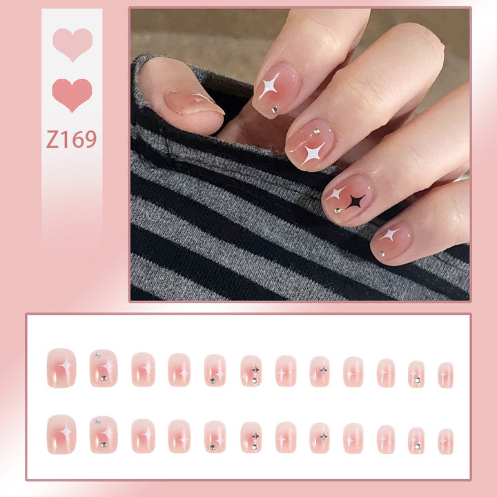 Acrylic nail set with sparkling star decorations and elegant accents Bowlift